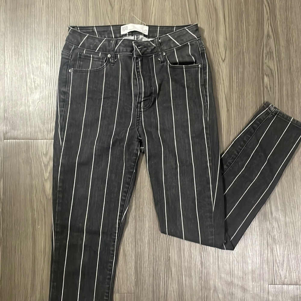 Stripped black and grey high rise skinny jeans.